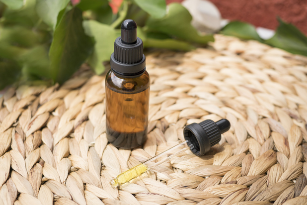 Tincture bottle with dropper used for CBD and hemp oil